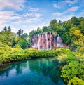 Picturesque morning view of Plitvice National Park. Colorful spring scene of green forest with pure water waterfall. Great