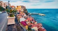 Picturesque morning view of Scilla town with Ruffo castle on background, administratively part of the Metropolitan City of Reggio Royalty Free Stock Photo