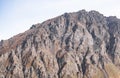 Picturesque multi-colored rocky mountain with insignificant vegetation in the mountains of the Caucasus Royalty Free Stock Photo