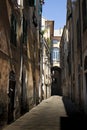 Picturesque narrow alley in Albenga, italy