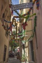 Picturesque narrow street in Alfama district, Lisbon, Porugal