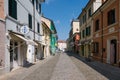 A picturesque narrow street in Cesenatico on a summer day, Emilia Romagna