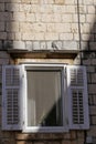 Picturesque narrow street with stone houses. Trogir, Dalmatia, Croatia, Europe Royalty Free Stock Photo