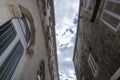 Picturesque narrow street with stone houses. Trogir, Dalmatia, Croatia, Europe Royalty Free Stock Photo