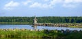 Picturesque natural landscape of the northwest of Russia. Chapel in the old Russian style on the shore of a small bay