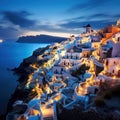 Picturesque night landscape of Santorini island, Greece. White-washed houses with beautiful lights