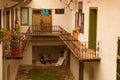 Picturesque old-fashioned courtyard of typical back yard of ancient residential building in downtown of city Maribor. Slovenia Royalty Free Stock Photo