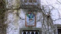 Picturesque Old House with bird decoration, surrounded by trees at Edinburgh city, Scotland Royalty Free Stock Photo