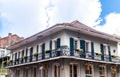 Picturesque old mansion on Bourbon Street. French Quarter, New Orleans Royalty Free Stock Photo