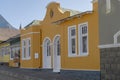 picturesque old mellow yellow building at historical town, Luderitz, Namibia