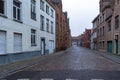 Picturesque old street of Bruges with traditional medieval houses Royalty Free Stock Photo