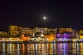 Picturesque Old Venetian Harbor in Chania, Crete Island, Greece at Night with Illuminated Buildings. Royalty Free Stock Photo