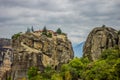 Picturesque panoramic landscape destination site of highland rocky christian monastery on top of Meteora mountains in Greece Royalty Free Stock Photo