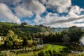 Picturesque park with evaporation from natural active geysers at