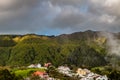 Picturesque park with evaporation from natural active geysers at Royalty Free Stock Photo