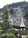 Stunning Lauterbrunnen valley view with a beautiful church, Swiss Alps, Switzerland, summer 2022