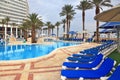 The picturesque pool and a high-rise hotel Royalty Free Stock Photo