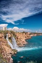 Picturesque and powerful Duden waterfall, a water stream breaks from a high cliff - this is a very popular place for tourists Royalty Free Stock Photo