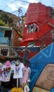 Picturesque red house in the favela comune thirteen o