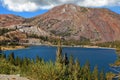 Picturesque red mountain on coast of lake Royalty Free Stock Photo