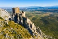 Rocky landscape with ruined Chateau de Queribus, France Royalty Free Stock Photo