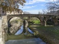 Picturesque roman bridge over Meder river in Vic city Catalonia, Spain
