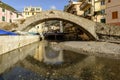 Picturesque roman stone bridge in sea village, Bogliasco, Italy