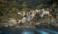 Village of vernazza with colourful houses at the edge of the cliff Riomaggiore, Cinque Terre, Liguria, Italy