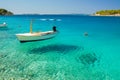 Picturesque scene of a boat in a quiet bay of Milna on Brac island, Croatia