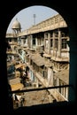 Picturesque scene captured through an arched window in New Delhi