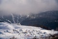 Picturesque scene of a group of majestic mountains covered in snow, Montenegro