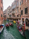 Groups of tourists on gondolas wandering in Venice, Veneto, Italy Royalty Free Stock Photo