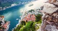 Picturesque sea view of Boka Kotorska, Montenegro, Kotor old town. Shoot from air, from mountain fortification, wide Royalty Free Stock Photo