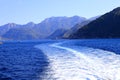 Picturesque sea view in Turkey, near Bodrum and Marmaris, a trace from a boat on the water, waves. Mountains and hills Royalty Free Stock Photo