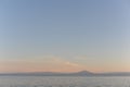 Picturesque seashore with beach and ocean waves and horizon on a sunny day with clear blue sky and calm ocean in Hokkaido, Japan