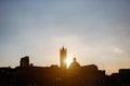 Picturesque silhouette view of Siena Cathedral Santa Maria Assunta (Duomo) at sunset golden hour, Tuscany, Italy. Scenic travel Royalty Free Stock Photo