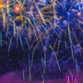 Picturesque sky in colorful sparks of festive fireworks, colored smoke and bright nebula, holiday background