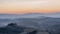 Picturesque sky at dawn on the Tuscan countryside south of Siena, Tuscany, Italy Royalty Free Stock Photo