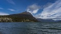 The picturesque snow-capped Andes Mountains surround the emerald lake Royalty Free Stock Photo