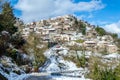 Picturesque Snowy Village with Traditional Houses in Greece, Northern Europe Royalty Free Stock Photo