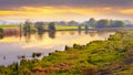 Picturesque spring landscape, sunset on the river, reflection of the sky in the river Royalty Free Stock Photo