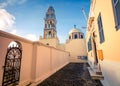 Picturesque spring scene of the Catholic Cathedral Church of Saint John The Baptistm in Fira village, Greece Royalty Free Stock Photo