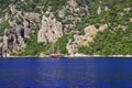 Picturesque spring, summer seascape. Yacht at sea in Turkey, against the backdrop of high mountains, near Bodrum and Marmaris,