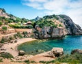 Picturesque spring view of West Court of Heraion of Perachora, Limni Vouliagmenis location. Colorful morning seascape of Aegean se