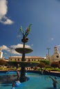 square with a garden of exotic flowers and sculptures of water fountain figures, moyobamba san martin peru -october