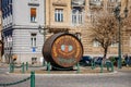 Picturesque street with renaissance and baroque historical buildings, Beer cask with slogan: Zatec town, where beer is home,