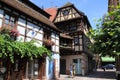 The picturesque streets of Obernai, with its colorful traditional houses, decorated with flower pots.