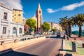 Picturesque summer cityscape of Bastia town with Iglesia Catholic church on background.