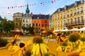 Summer view of Grand Place square with belfry of Church of St. Elizabeth in Mons