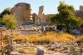 Picturesque sunny landscape view ruins of antique stone buildings. Kanlidivane ancient city